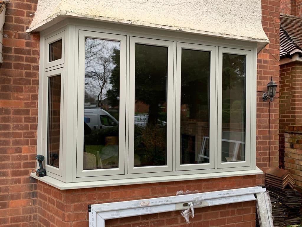 Bay window aluminium frame installation by Urban Shopfronts